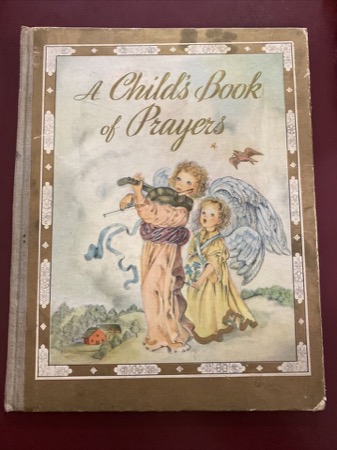 A Child's Book of Prayers by Louise Raymondby: Louise Raymond/ Masha