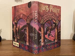 Harry Potter and the Sorcerer's Stone by: J.K. Rowling