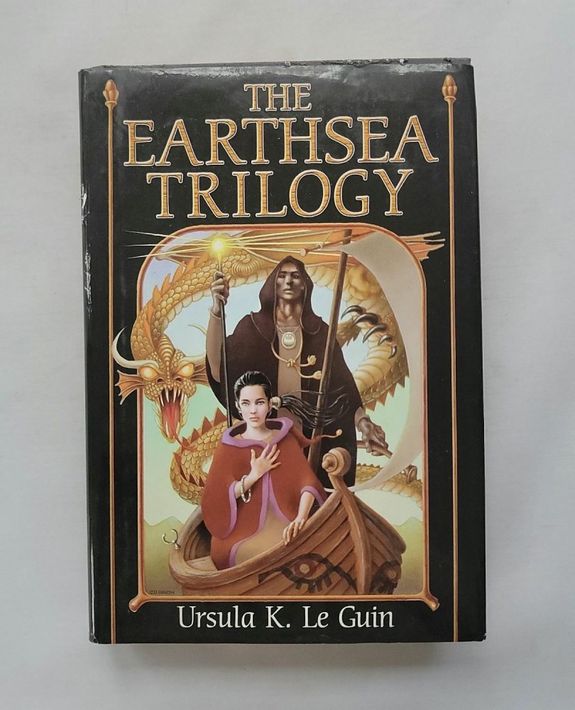 The Earthsea Trilogy (A Wizard of Earthsea, The Tombs of Atuan, The Farthest Shore)by: Ursula K. Le Guin 